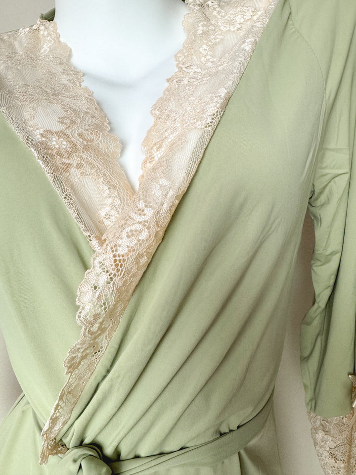 Light green robe with lace trim on a mannequin