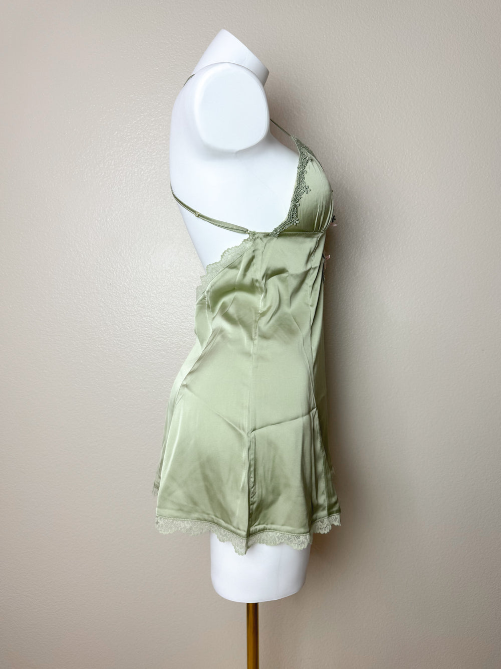 Side view of Green Plunge Lace-Trim Cross Back Slip