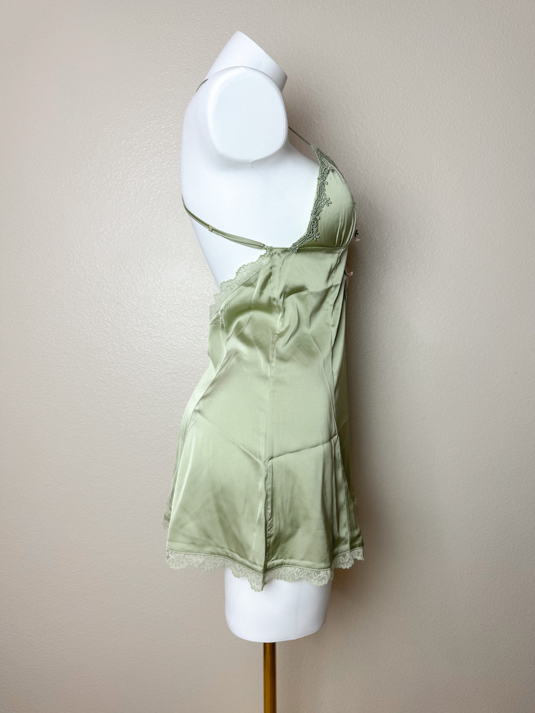 Side view of Green Plunge Lace-Trim Cross Back Slip